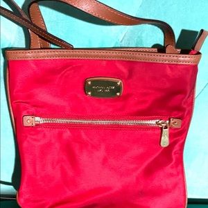 Michael Kors 9” square / flat Crossbody bag.